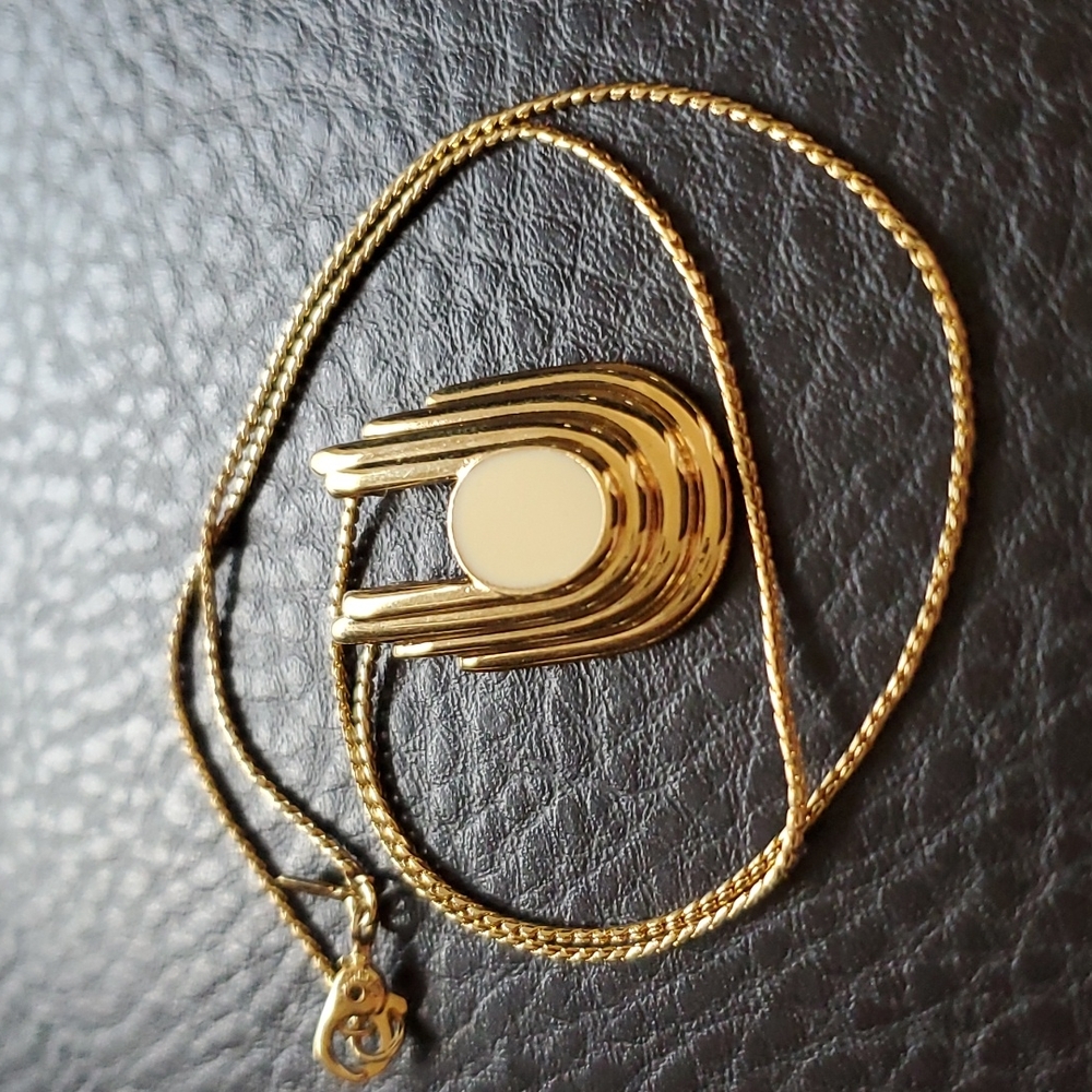 Monet Gold-Tone Layered Arch Pendant Necklace with Cream Inlay